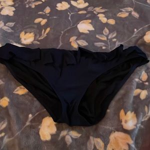 Size large worn once bikini bottoms with ruffled waistline